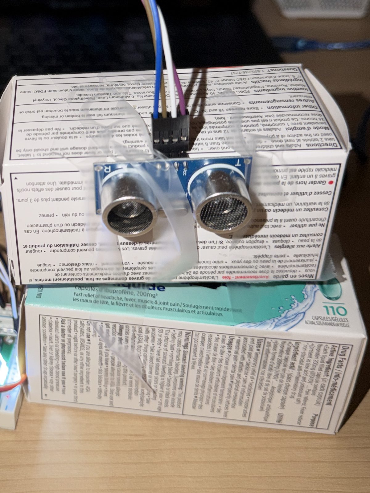 HC-SR04 sensor on the rotating box, which rides on the servo horn.